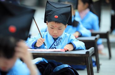 Young student in Shanghai learning penmanship